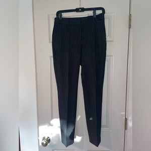 Black pinstripe columnist ankle pants